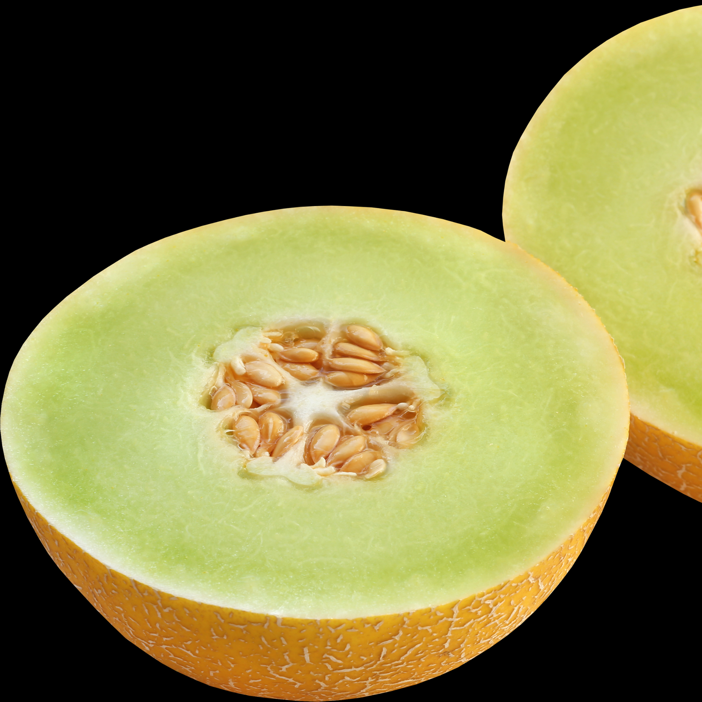 a cut open bright green flavour journey honeydew Mellon fruit with an orange exterior and green interior with seeds in the middle against a black background