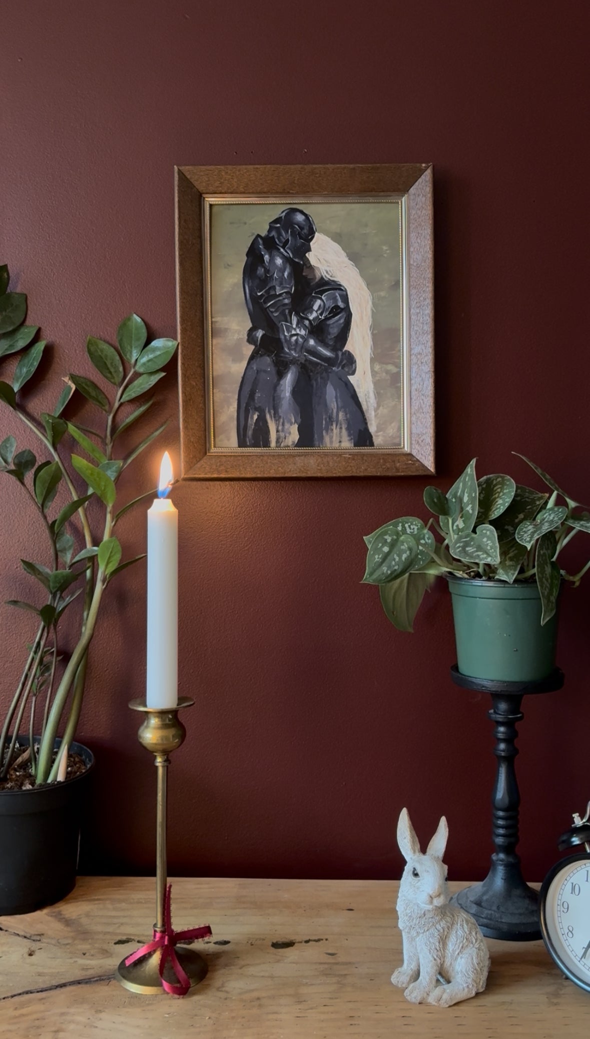 a fantasy inspired art print of a woman and a man both dressed in armour holding each other