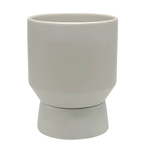 white ceramic planter with matching cup underneath with white background