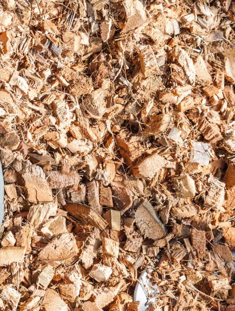 Close-up of coco coir wood chips or mulch with a brown color.