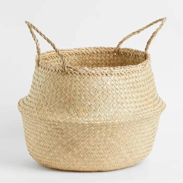 sea grass wicker basket with handles with white background