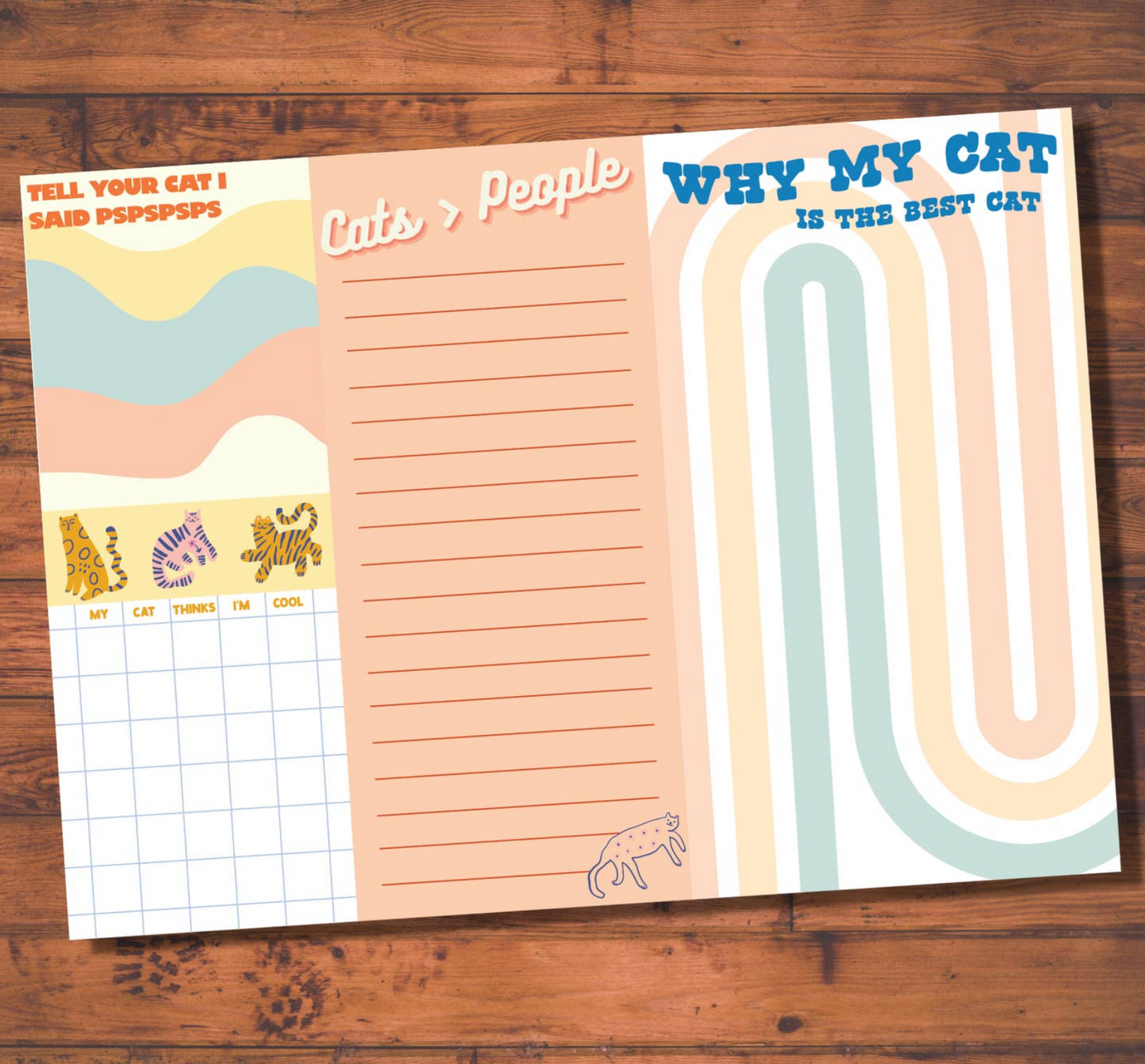 a cat themed note pad with cat related runs on a wooden surface