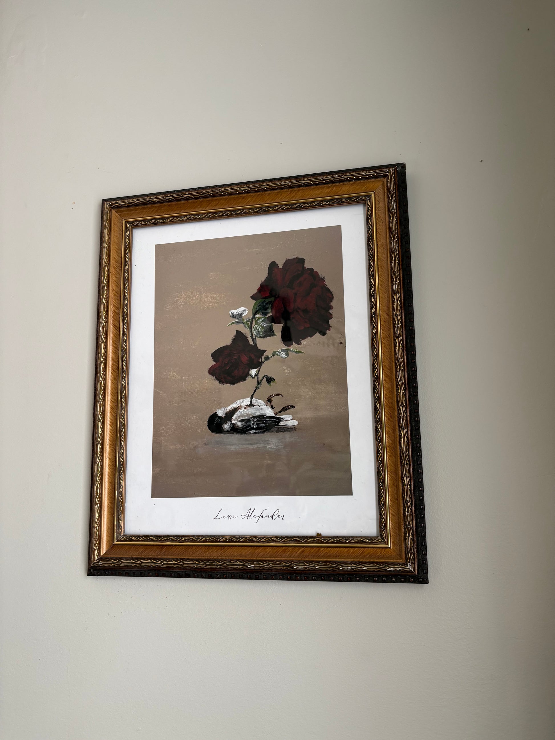 Framed Fantasy Art Print - Take Flight artwork of a bird and flowers on a beige wall