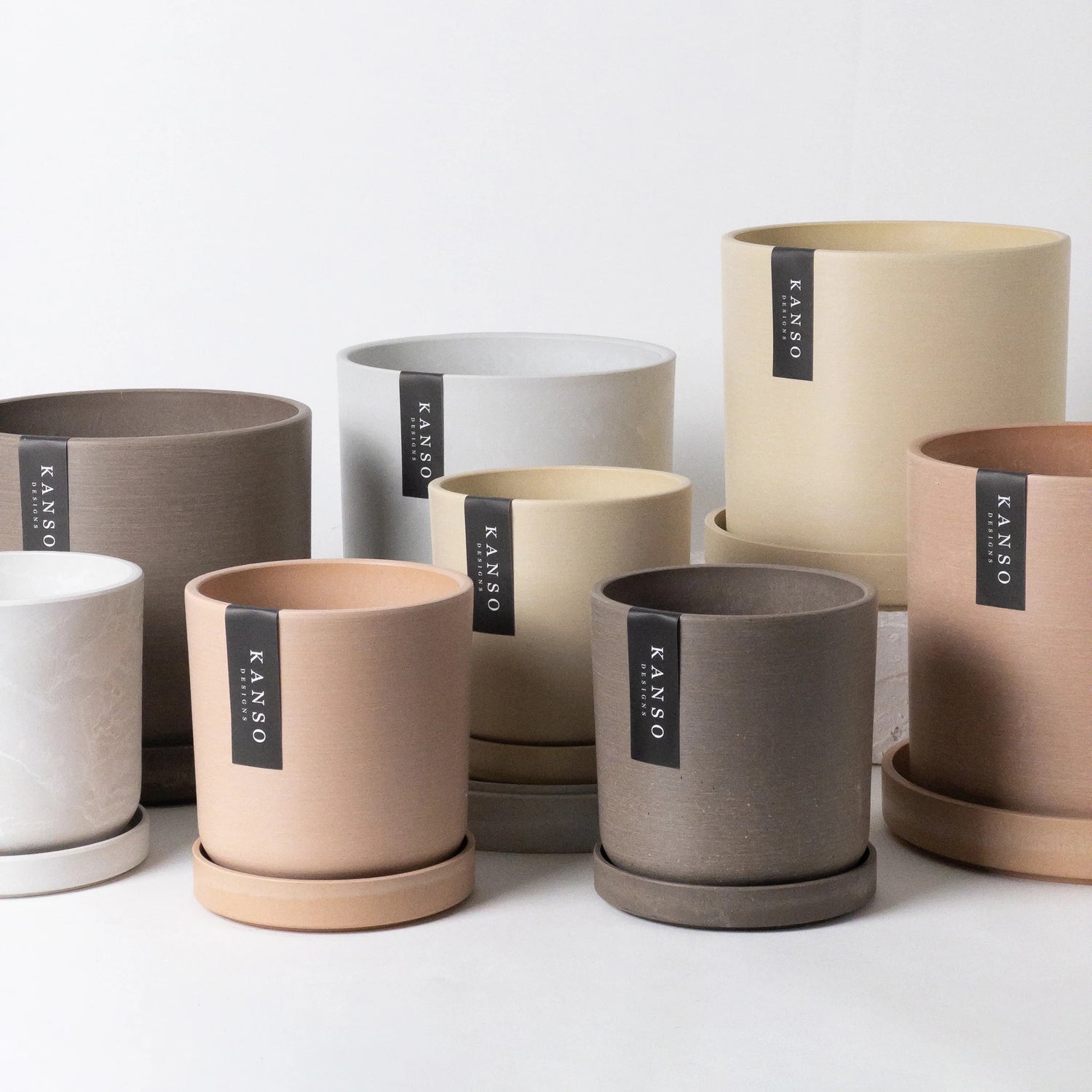 Set of pots with 'KANSO' label on a white background