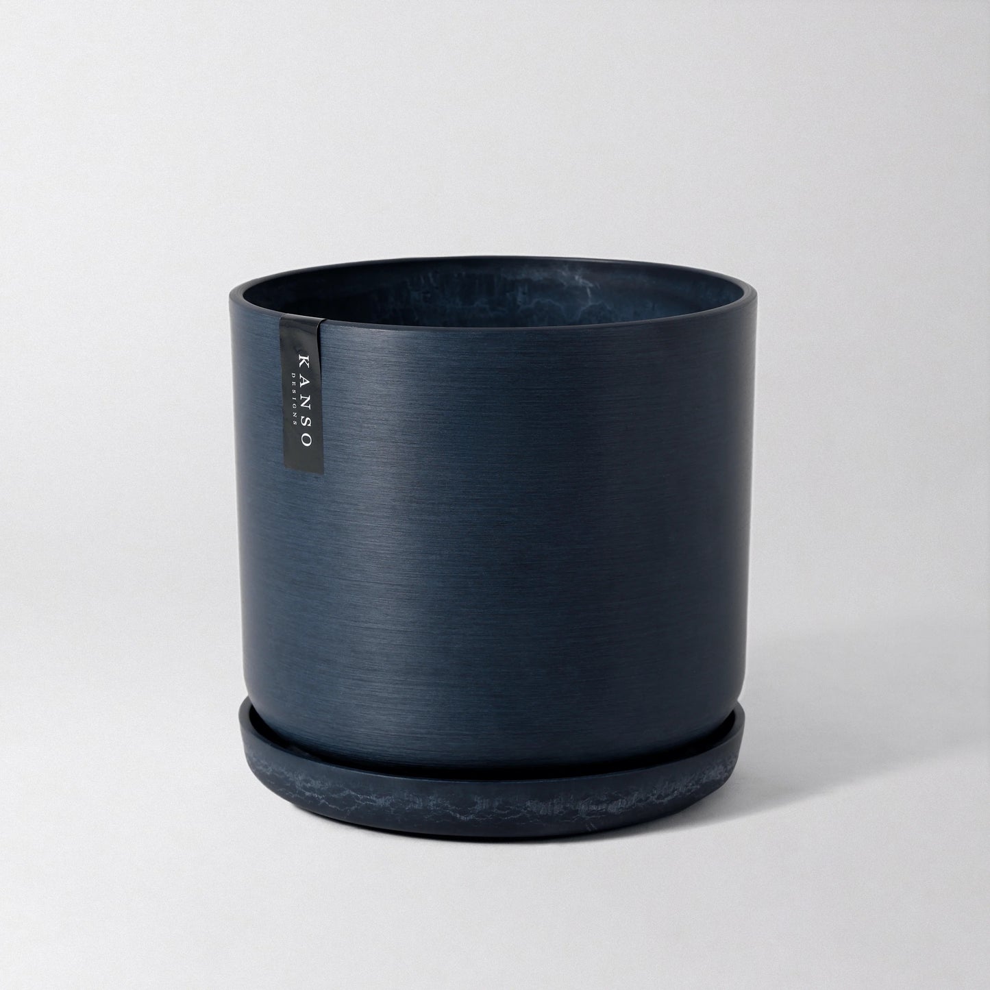 Dark Blue planter with 'Kanso' Designs branding on a light gray background