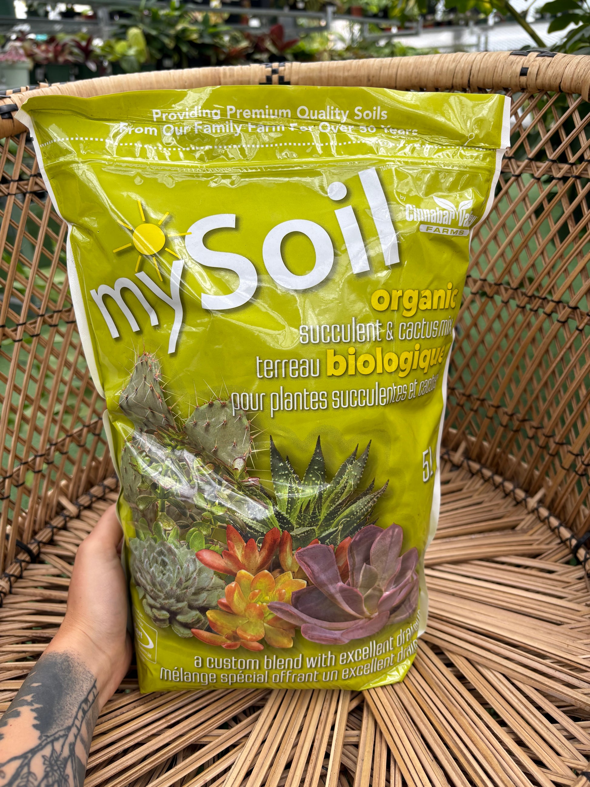 Bag of mySoil organic fertilizer on a woven surface
