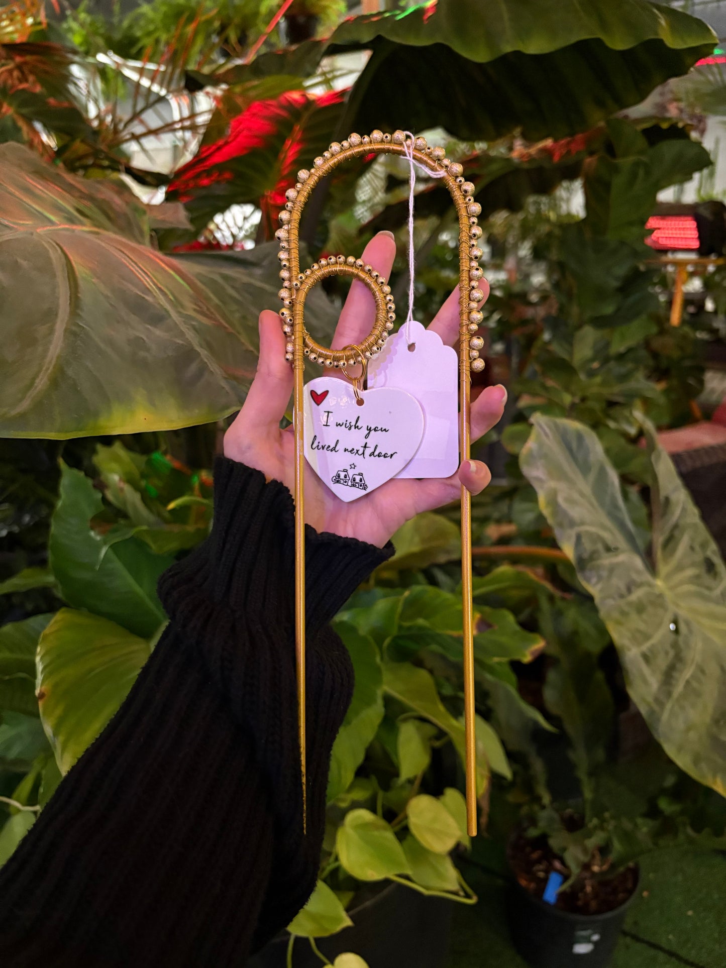 arch shaped plant stake sun catcher beaded with a heart that says I wish  you lived next door