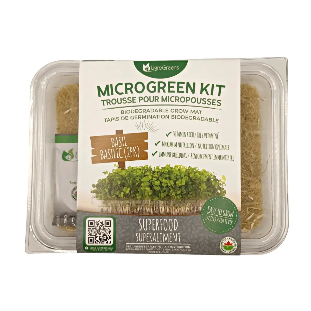 a clear package labeled micro green kit biodegradable grow mat basil, containing basil micro green seeds with the package resting on a white background