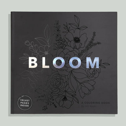 black colouring book with flower details and the word bloom with a white background