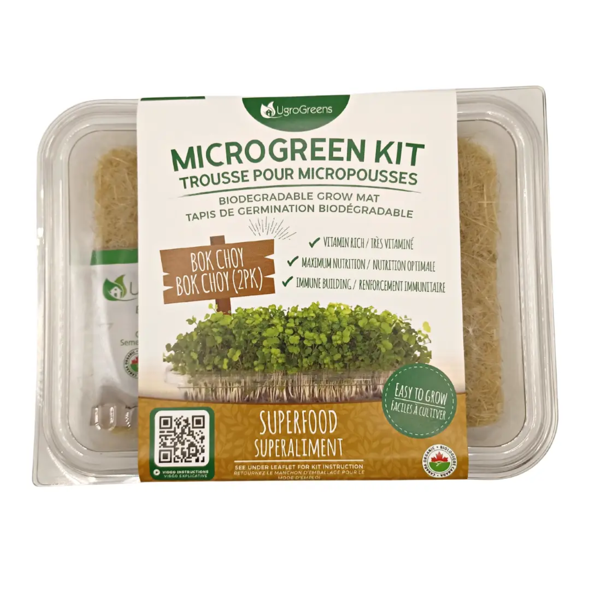 a clear package labeled micro green kit biodegradable grow mat containing bok choy micro greens whit the package resting on a plain white background