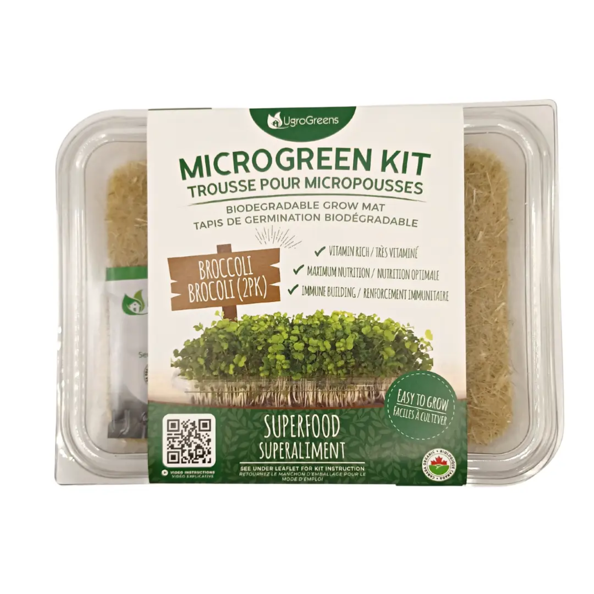 a clear package labeled micro green it biodegradable grow mat with broccoli micro greens inside with the package resting on a plain white surface