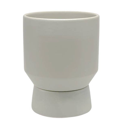 white ceramic planter with matching cup underneath with white background 