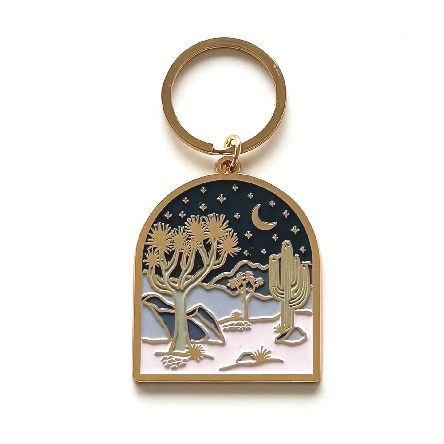 Keychain with desert landscape design featuring cacti and a moon on a white background