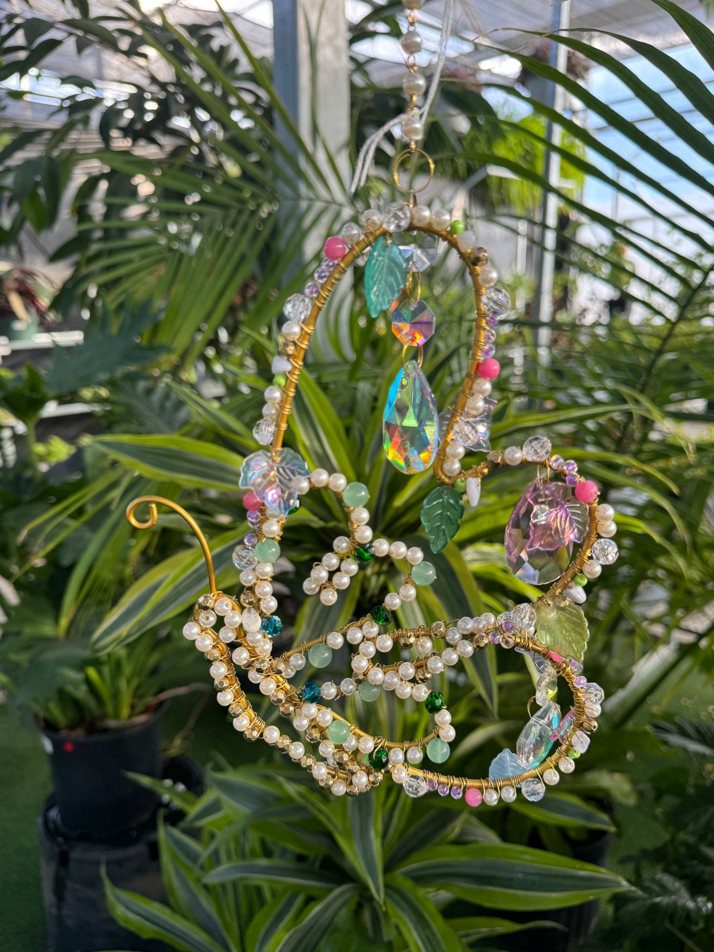 decorative butterfly shaped crystal sun catcher with dangling sparkling stones