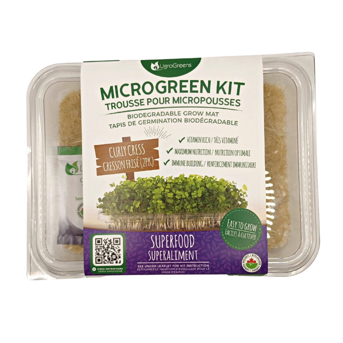 A packaged microgreen kit in a clear plastic container with a large front label reading 'MicroGreen Kit' containing curly cress micro green on a white background.