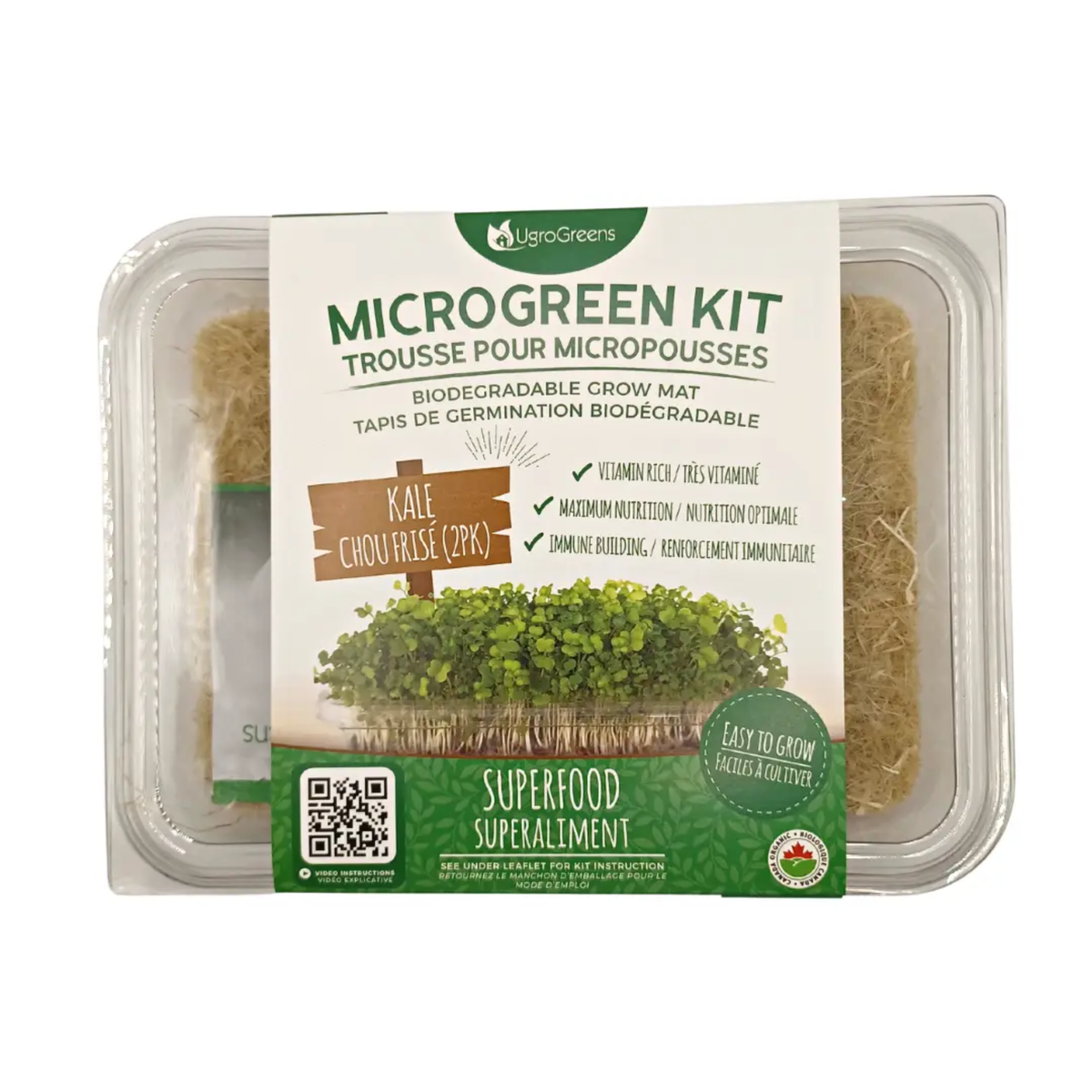 a clear container with a label that reads micro green kit biodegradable grow mat containing kale micro green seeds with the package resting on a white package
