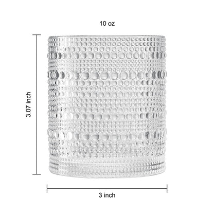 a clear textured plastic lowball cups with measurement details against a white background