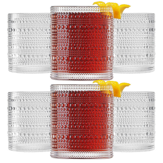 two sets of three clear ups with the front one filled with red liquid