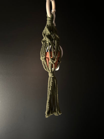 Close-up of a knotted rope with a dark background