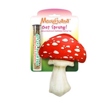 A refillable catnip toy shaped like a mushroom with a compartment for refilling, packaged on a pink and green cardboard backing.