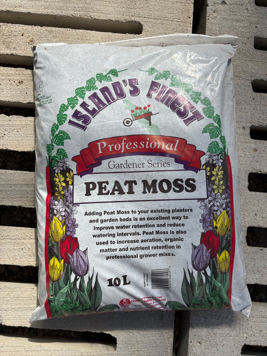 a white bag of peat moss on a concrete surface