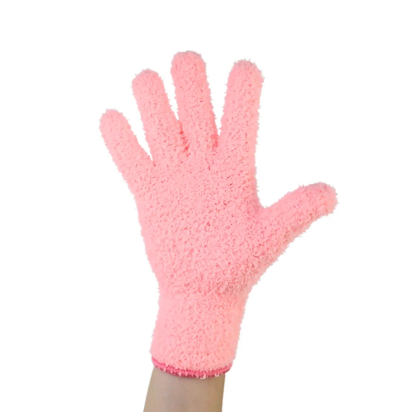 a hand wearing a pink microfiber glove against a white background