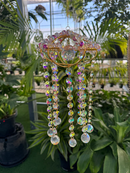 decorative sun catcher with pink crystals and many hanging crystal beads