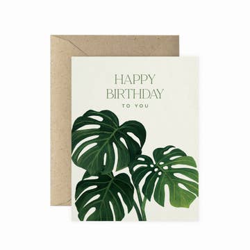 a plant themed card that says happy birthday to you on a white background