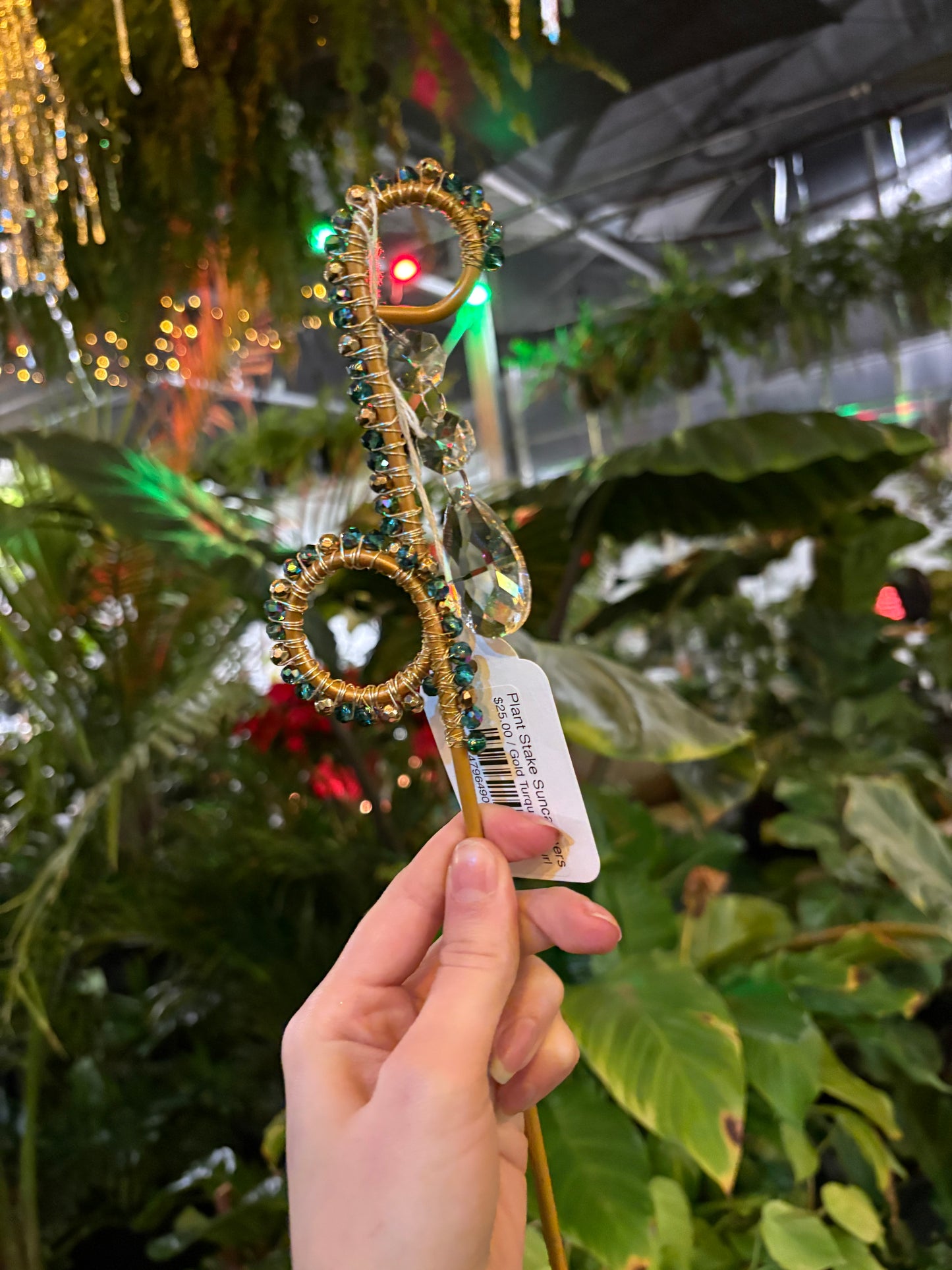 decorative swirly plant stake sun catcher with blue and clear crystals