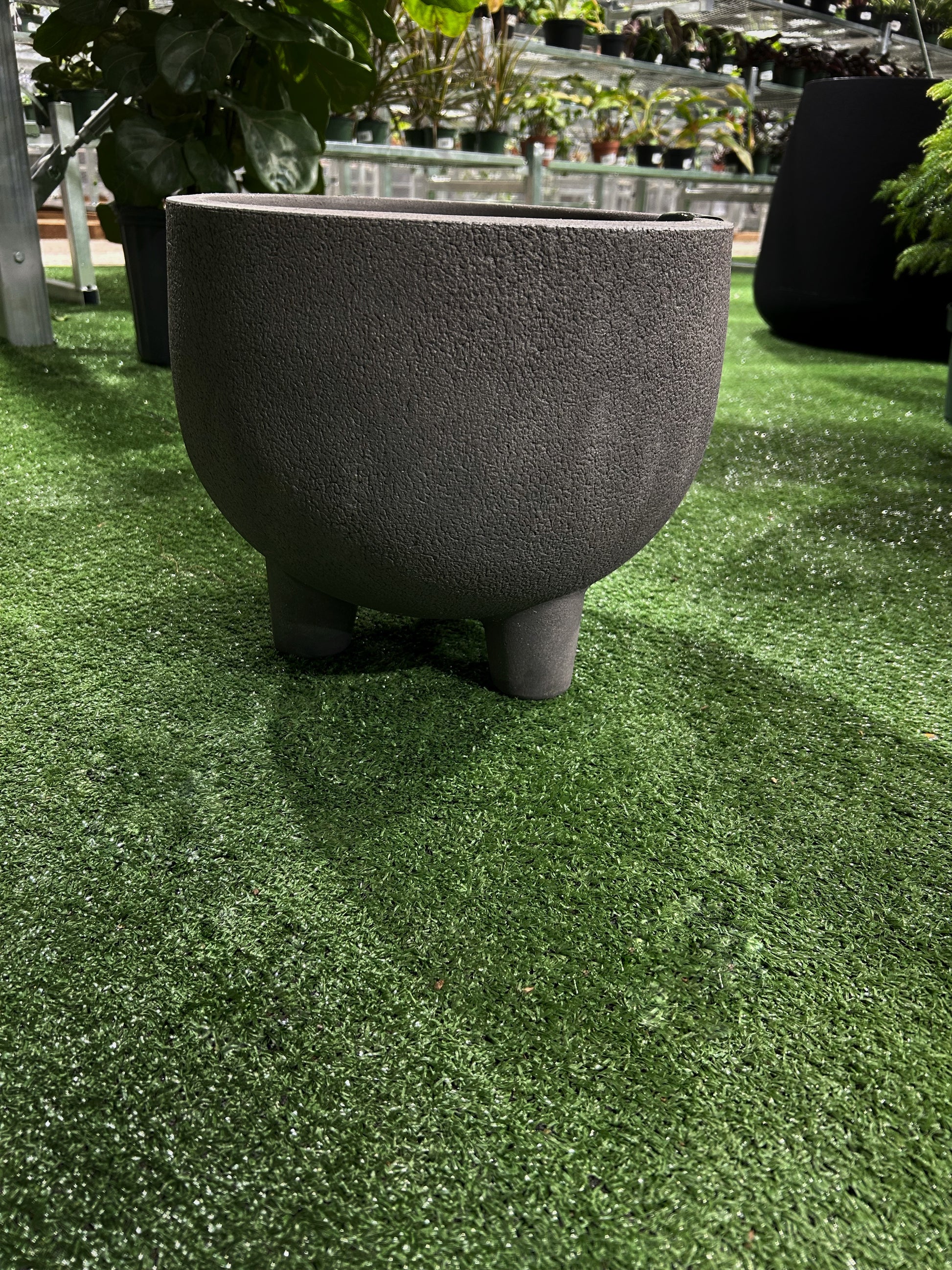 “Rustic round planter black matte ceramic with legs 