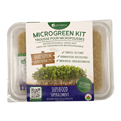 a clear package with a label that reads micro green kit biodegradable grow mat with salad supreme micro greens with the package resting on a white surface background