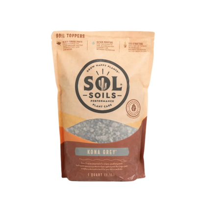 a tan bag of sol soils Kona grey soil topper standing with a white background
