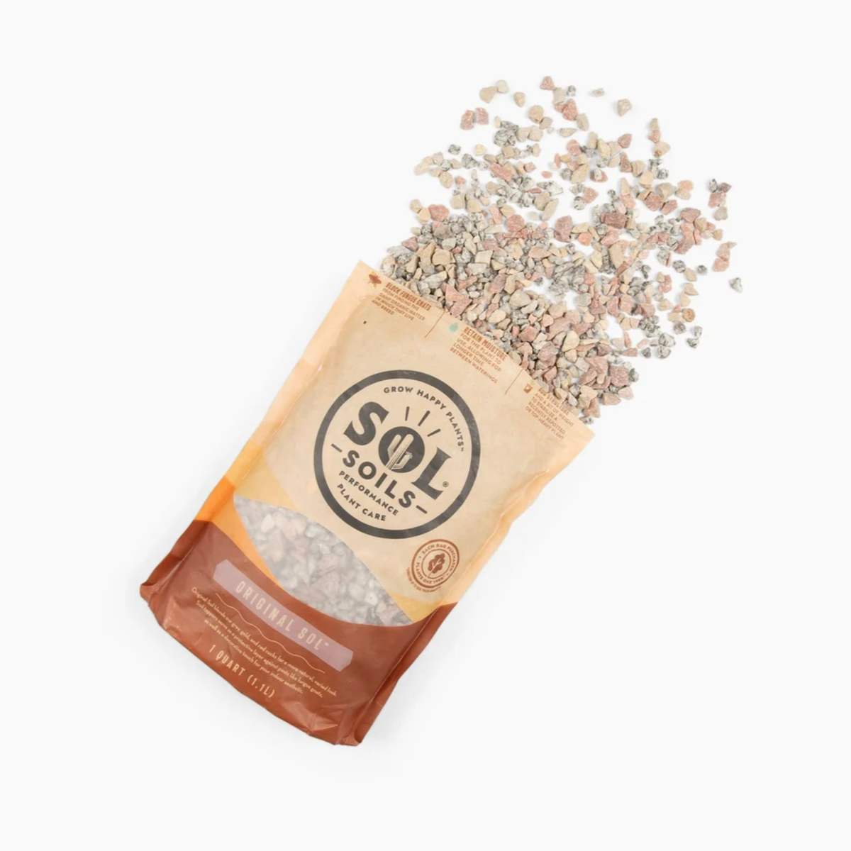 a tan bag of sol soils original sol soil topper with its content spilled onto the white background