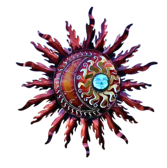 A decorative sculpture of a sun with moon inside the center and multiple rays extending from the center, with a vibrant red and brown color palette.